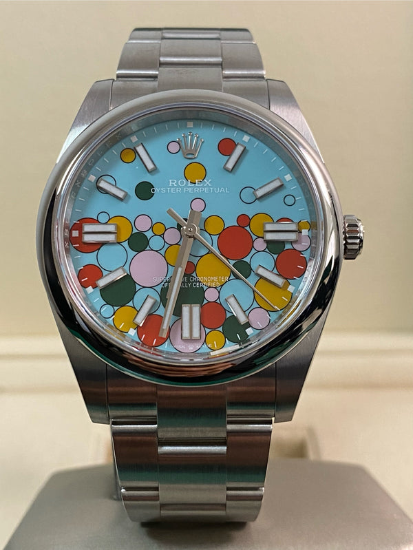 Rolex Oyster Perpetual 41 - 2023 - Domed Bezel - Turquoise Blue Celebration-Motif Dial - Oyster Bracelet - 124300 *FULL SET*