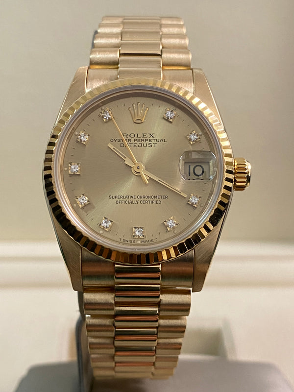Rolex Yellow Gold Datejust 31 - N serial - Fluted Bezel - Factory Diamond Dial - President Bracelet - 68278