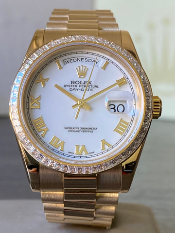 Rolex Yellow Gold Day-Date 36 - P Serial - Baguette Diamond Bezel - White Roman Dial - President Bracelet - 118398BR